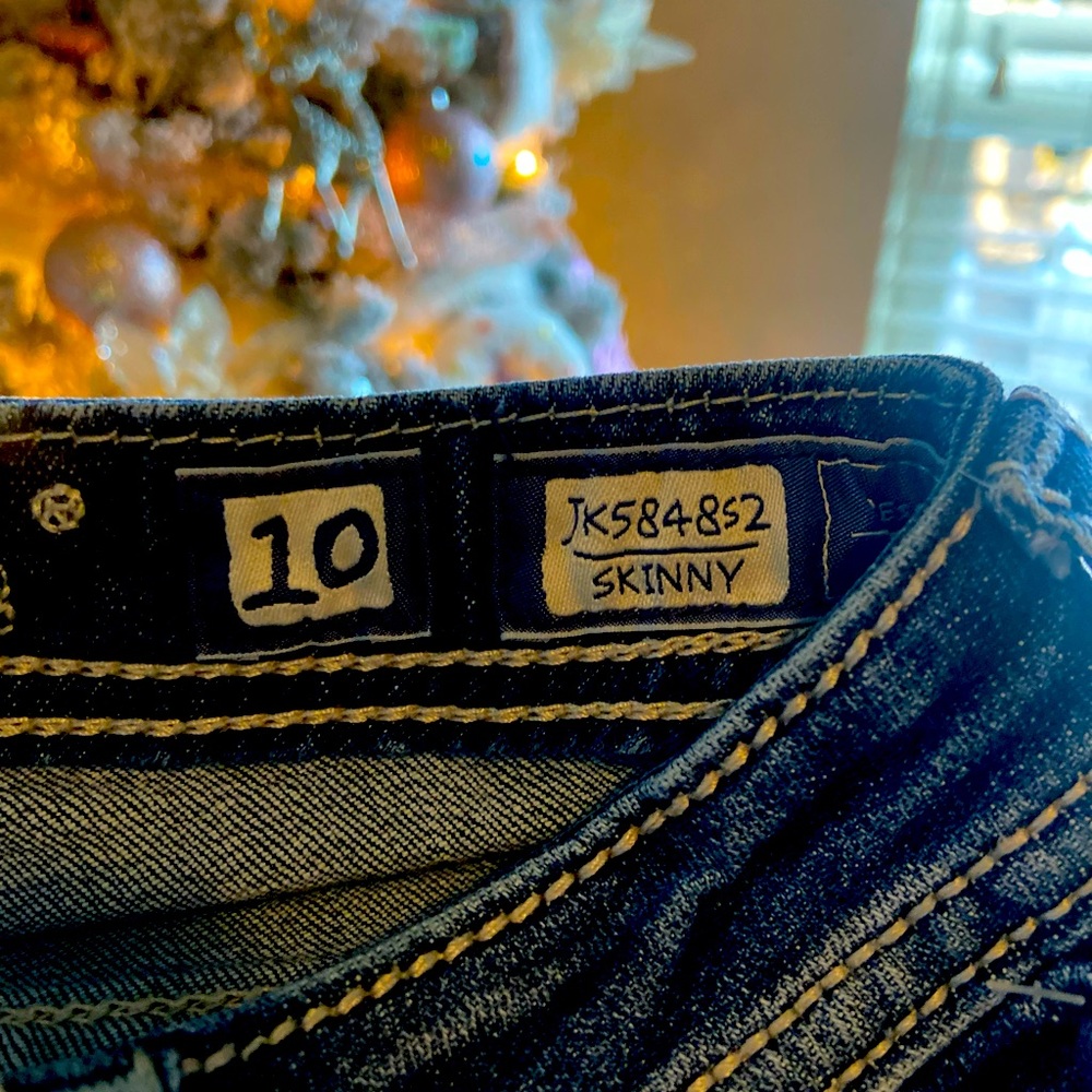 Miss Me blue denim jeans.